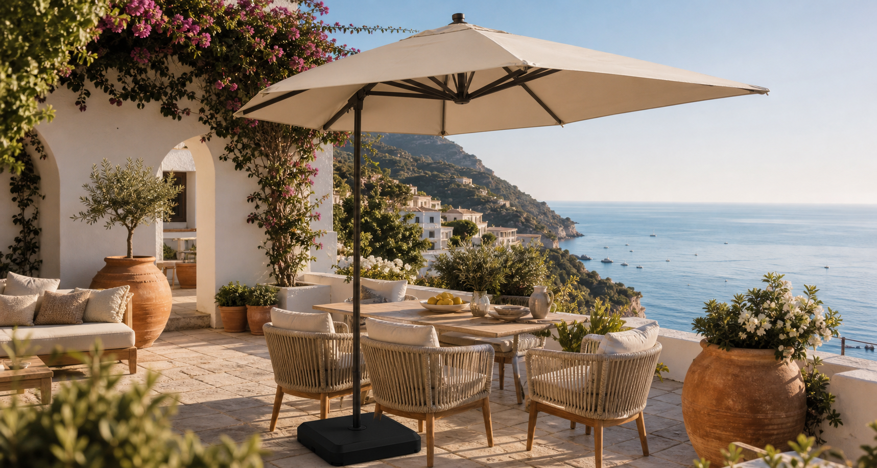 Southern Italy coastal terrace with outdoor furniture and umbrella base